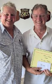 Wallace Roy congratulating Murray Tinker on his championship victory