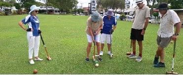 Members coaching visitors at Tweed Heads Come and Try day